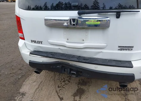 2010 Honda Pilot Touring z USA, uszkodzony, nr VIN 5FNYF4H92AB031653